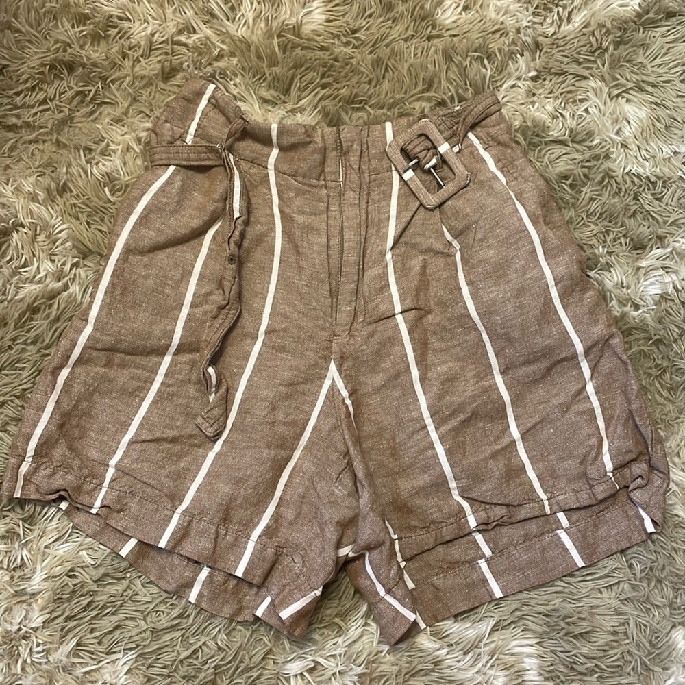a new day, size small shorts. Brown with white stripes, comes with a belt.